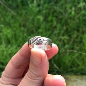 Hand forged textured silver band ring with rose